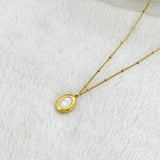 White oval neckl