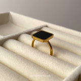 Black and white square ring
