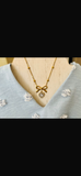 Bow stone necklace