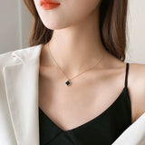 Black clover necklace