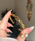 CD. Branded handcuff