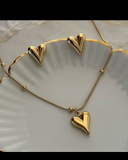 Heart necklace with studs