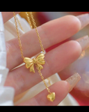 Bow with heart necklace