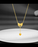 Bow with heart necklace