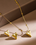 Heart necklace with studs