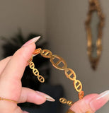 CD. Branded handcuff